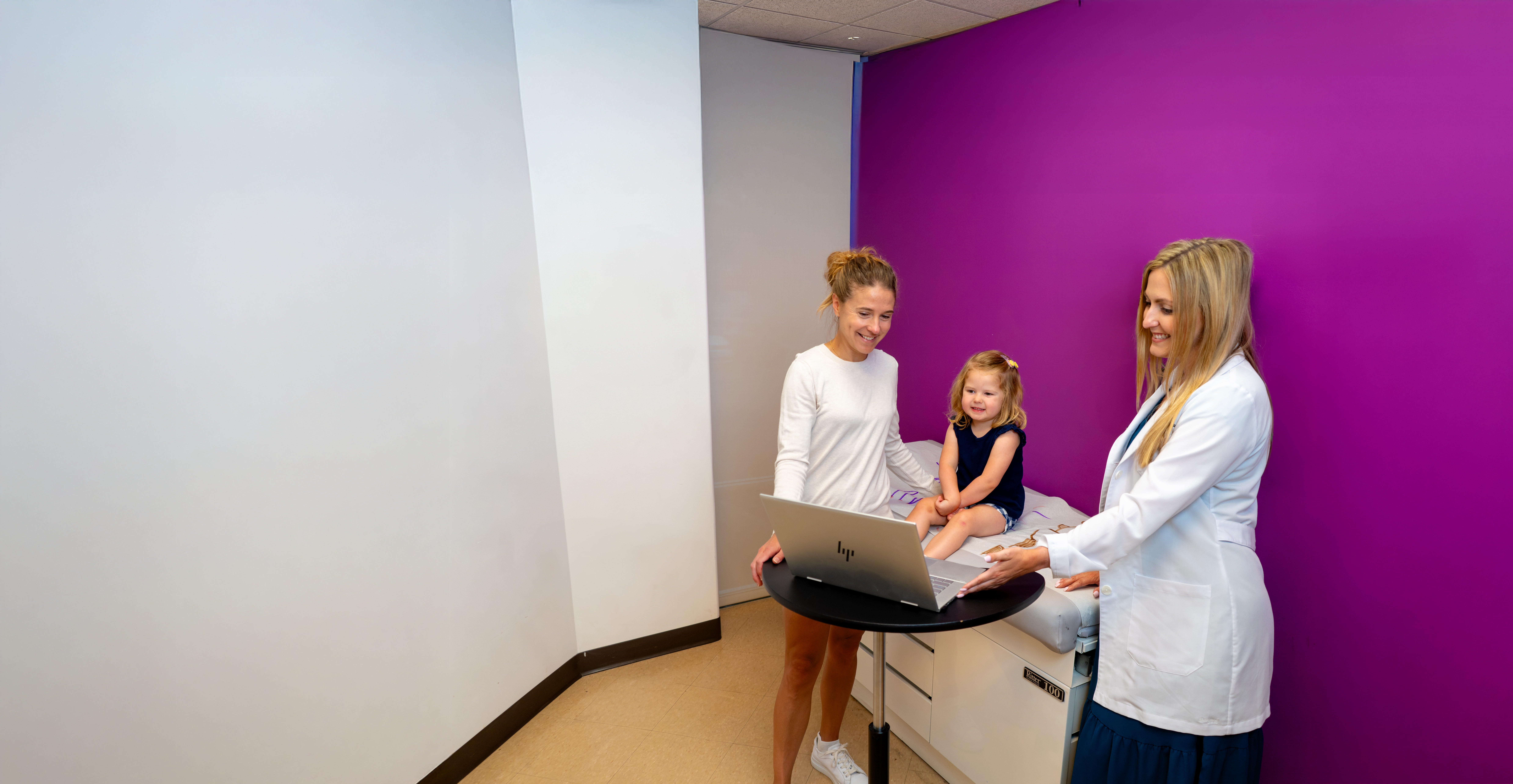 Ava with Provider and Mom - edited